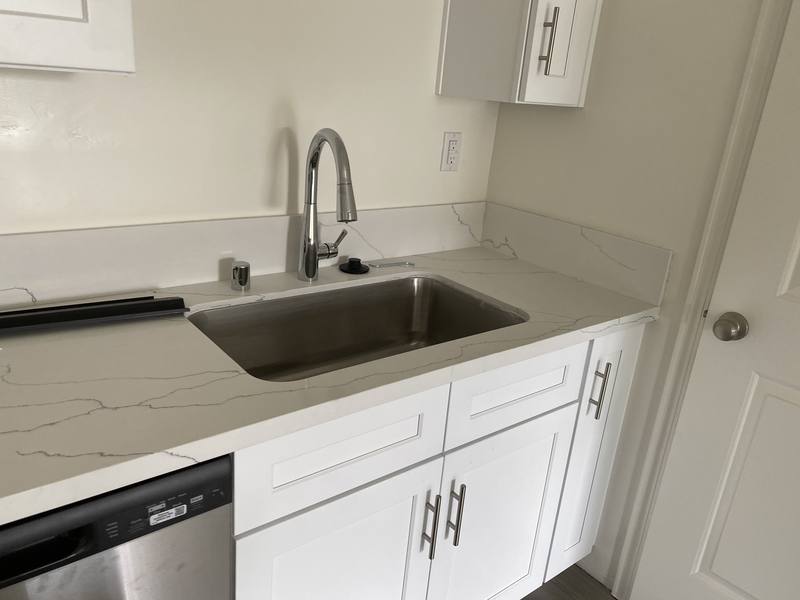 Finished kitchen with stainless undermount sink and new faucet